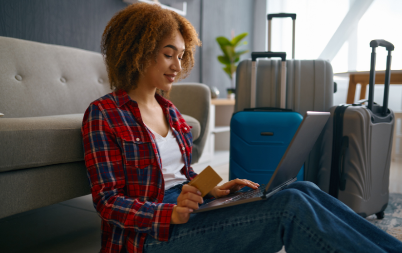 Woman shopping on eBay with a credit card, showcasing profitable eBay strategies for online buyers and sellers.